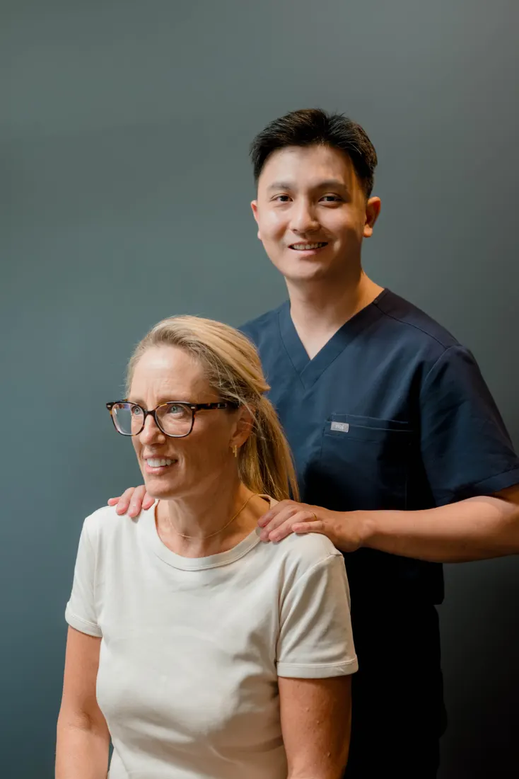 Dr Ryan Tan with a practice member