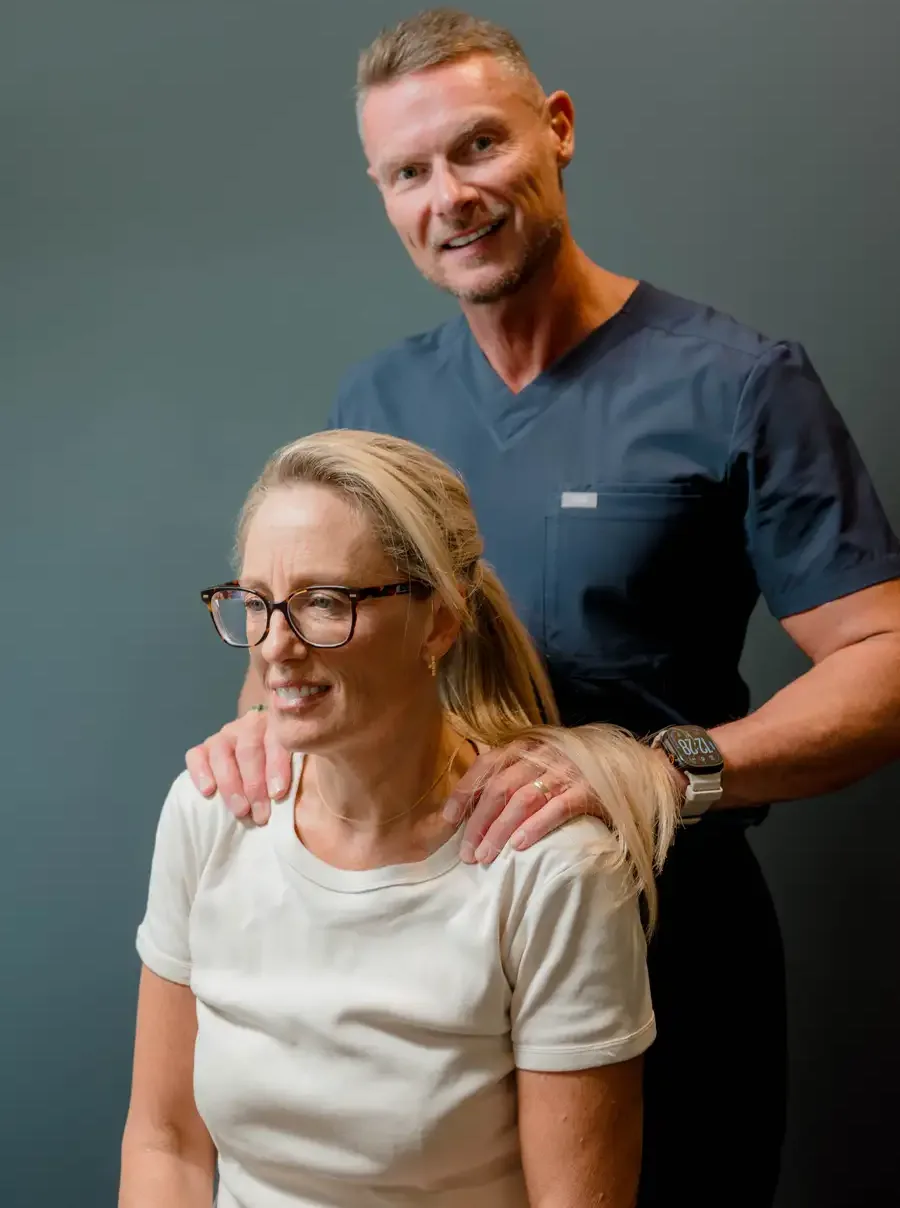 Dr Ben Carvosso with a practice member at Mornington Peninsula Chiropractic